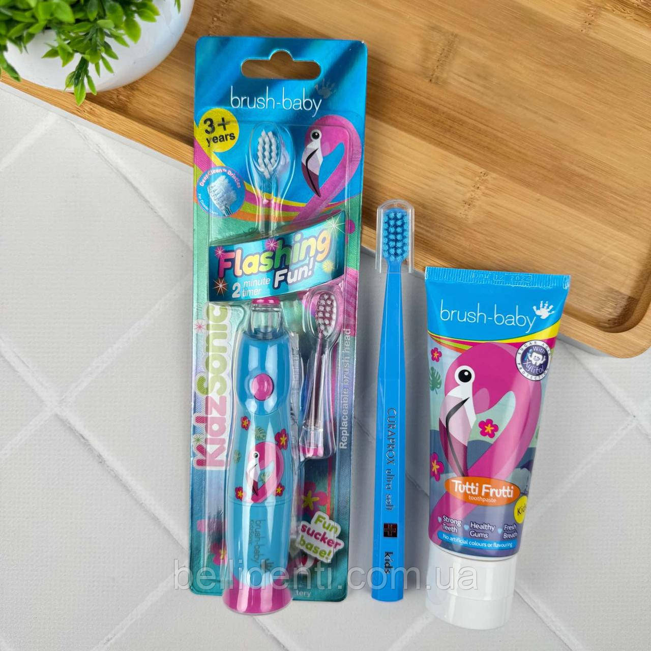Набір Brush-Baby KidzSonic Curaprox Kids від 4-12 років (паста 50 мл тутті-фрутті+2 зубні щітки), фламінго
