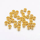 Бусини затискні Стопери, Кримпи, Латунь, Рондель, Колір: Золото, Розмір: 2x3мм, Отвір 2 мм, 5 г/приблизно 140 шт, фото 2