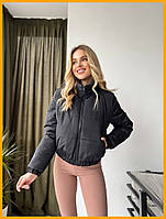 Жіноча стьобана куртка коротка вулична спорт шик з манжетом на блискавці молочний 42-48