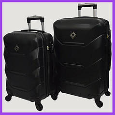 Набір валіз Bonro 2019 - 2 шт (M+L) середня і велика чорні дорожні пластикові на колесах з кодовим замком і висувною ручкою