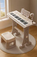 Детское пианино-синтезатор 6655 на ножках со стульчиком и микрофоном Розовый