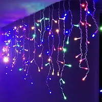 Новорічна світлодіодна гірлянда бахрома, прозорий шнур, 3*0,5 м, 120 LED, 220 V колір свічення мультик.