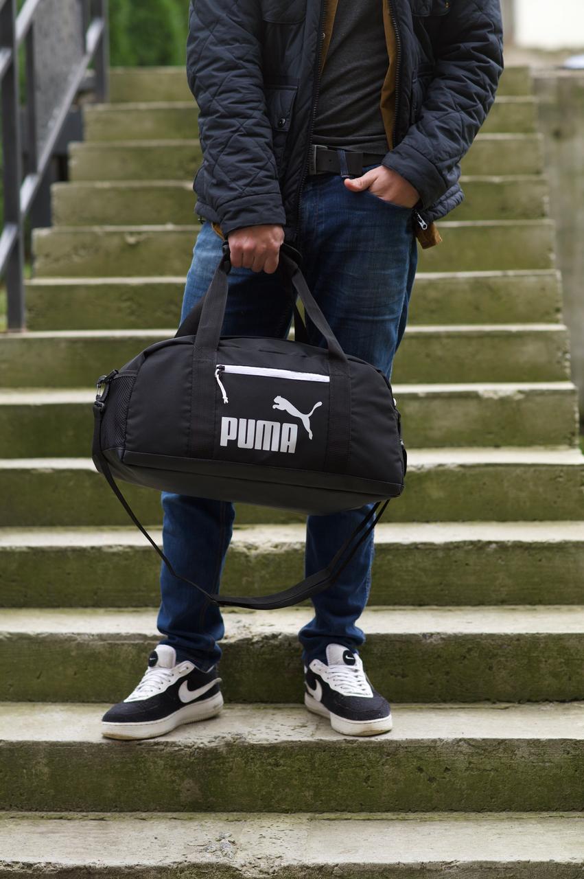 Cпортивна чорна сумка Puma - енергія руху та зручність кожного дня