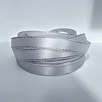 Стрічка атласна однотонна 0,9см. (33 м) біла зі срібним люрексом