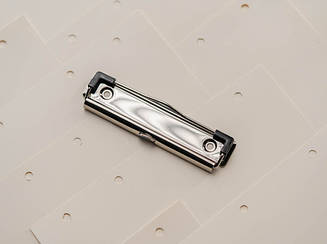 Затискачі для блокнотів і паперу універсальні. Колір "Срібло". 120х30мм