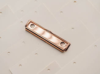 Затискачі для блокнотів канцелярські універсальні. Колір "рожеве золото". 120х30мм