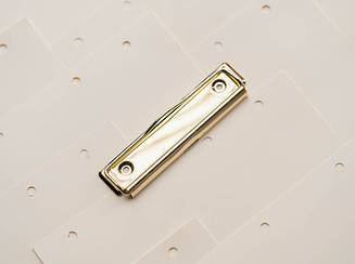 Канцелярські затискачі для блокнотів універсальні. Колір "Золото". 120х30мм