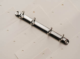 Канцелярські затискачі для блокнотів. Колір "Срібло". 210х21мм. кільце 25 мм.