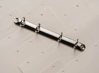 Затискачі для блокнотів канцелярські універсальні. Колір "Срібло", 210х20мм. Кільце 30мм