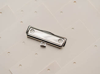 Затискачі канцелярські для блокнотів і паперу. 100х30мм