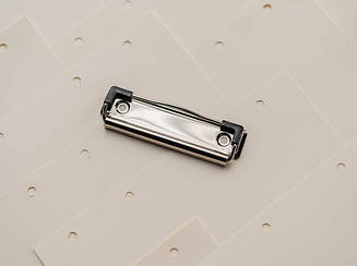 Затискачі для блокнотів і канцелярських папок. Колір "сріблястий" 100х30мм