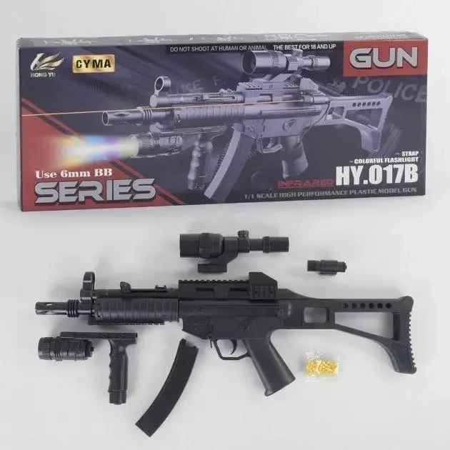 Іграшковий автомат Cyma HY 017B на кульках з лазерним прицілом, ліхтариком та стрільбою кульками, фото 1