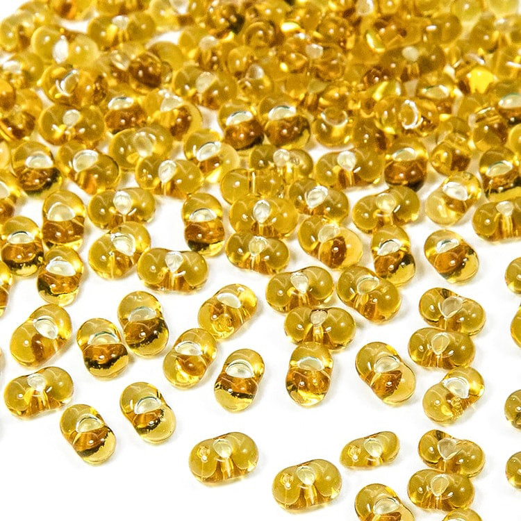 Бісер Preciosa FARFALLE 17050, Прозорий зі срібною смугою TSL, Розмір 3.2x6.5 мм, Колір: Золотистий, 50 г, фото 1