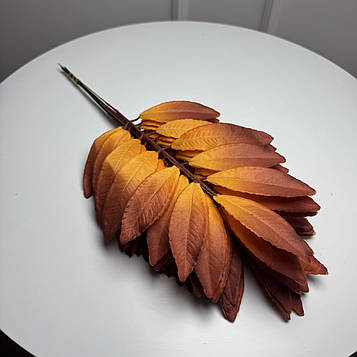 Штучна гілка лавровий лист помаранчево-коричневий, 45 см, 12 шт./пач.