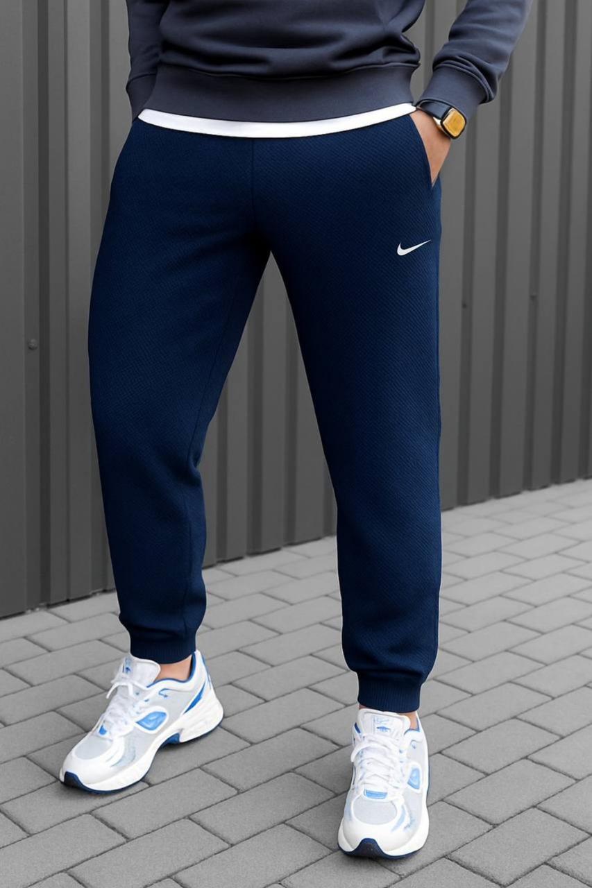 Спортивні теплі зимові чоловічі штани з манжетами трикотаж лакоста на флісі темно-сині розмір 46-54