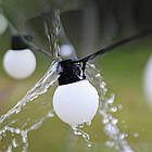 Вулична гірлянда із сонячною панеллю 50 лампочок теплий білий для прикраси саду тераси та балкона, фото 5