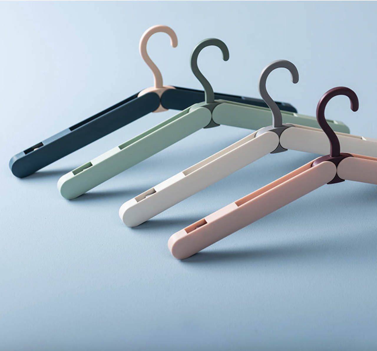 Складана вішалка для одягу з зажимами, пластик. Рожева