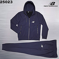 Теплий спортивний костюм New Balance Темно-синій утеплений костюм із капюшоном