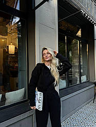 Теплий комбінезон з капюшоном на блискавкці чорного кольору