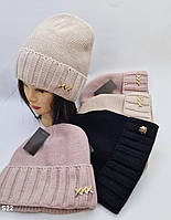 Жіночі в’язані шапки на флісі оптом