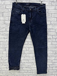 Утепленні чоловічі джинси  привужені на байці