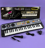 Дитячий синтезатор MQ 4915  від батарейок та від мережі, 10 мелодій, функція запису, мікрофон, в коробці