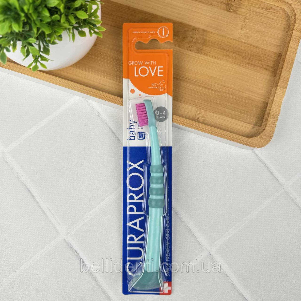 Зубна щітка Curaprox Baby CuraKid CS 5500 (від 0 до 4 років) бірюзова з рожевою щетиною, 1 шт