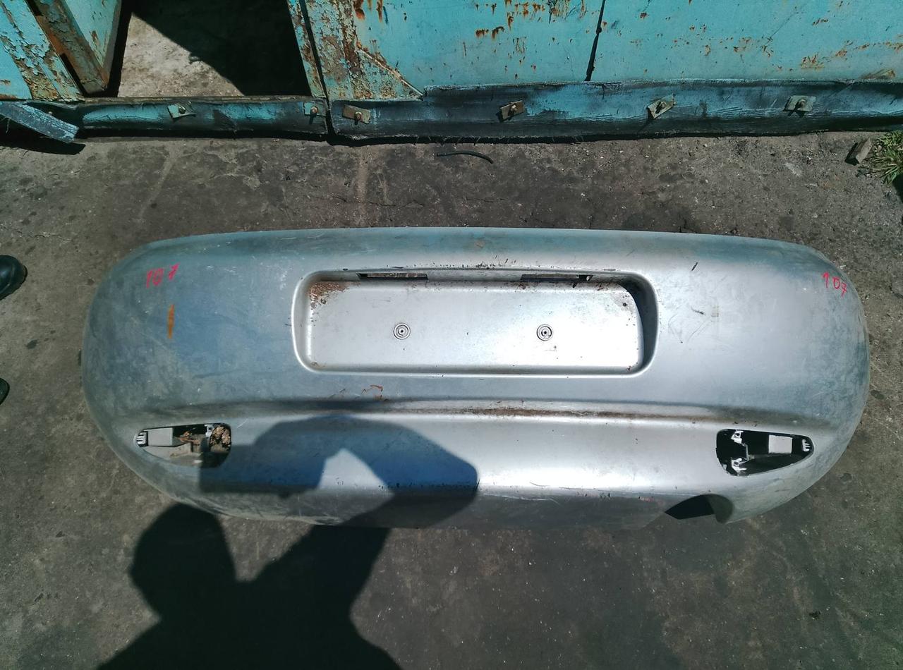 Вітаю зацікавлених на авто розборці Чемпіон !!!<br />
 Предметом оголошення є&nbsp;Бампер Задній Ford Puma 1997 - 2002 V97FB17K823&nbsp;<br />
 Фактичний стан на фото. Гарантія 14 днів на встановлення та перевірку<br />
 Висилаємо по всій Україні по передоплаті на транспортні витрати!<br />
 Наявність та асортимент на складі постійно змінюються.<br />
 Точні деталі уточняйте по телефону +380973363743 — фото 1