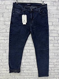 Утепленні чоловічі джинси  привужені на байці