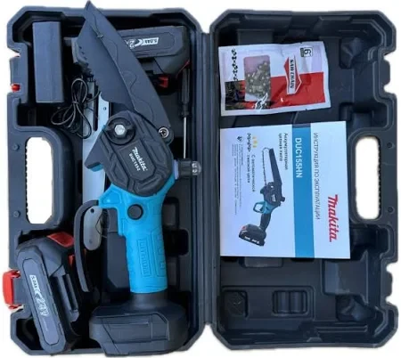 Акумуляторна пила Makita DUC155HN 24 V 4 A. Дві шини та два ланцюги 15 і 20 см. Мастило ланцюга., фото 1