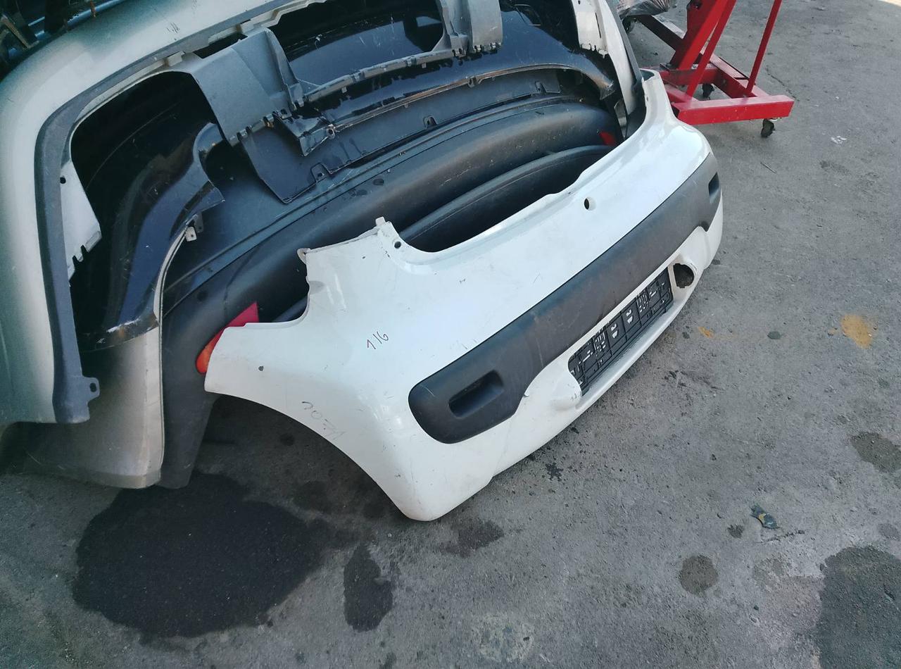 Вітаю зацікавлених на авто розборці Чемпіон !!!<br />
 Предметом оголошення є&nbsp;Бампер Задній Citroen C1 2005-2014 Peugeot 107 7410Y8 521590H050&nbsp;<br />
 Фактичний стан на фото. Гарантія 14 днів на встановлення та перевірку<br />
 Висилаємо по всій Україні по передоплаті на транспортні витрати!<br />
 Наявність та асортимент на складі постійно змінюються.<br />
 Точні деталі уточняйте по телефону +380973363743 — фото 4