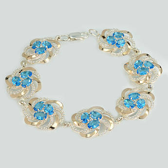 Срібний набір з золотими пластинами