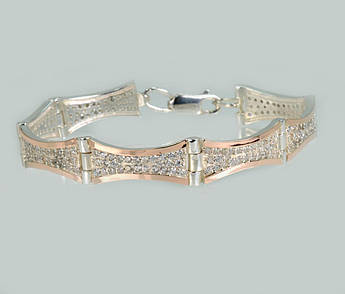 Срібний браслет з золотими напайками