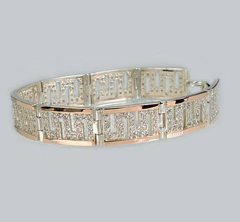 Срібний браслет з золотими пластинами