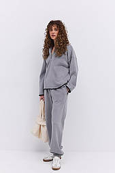 Флісовий жіночий костюм зі штанами на манжеті в розмірі L/XL в сірому  кольорі