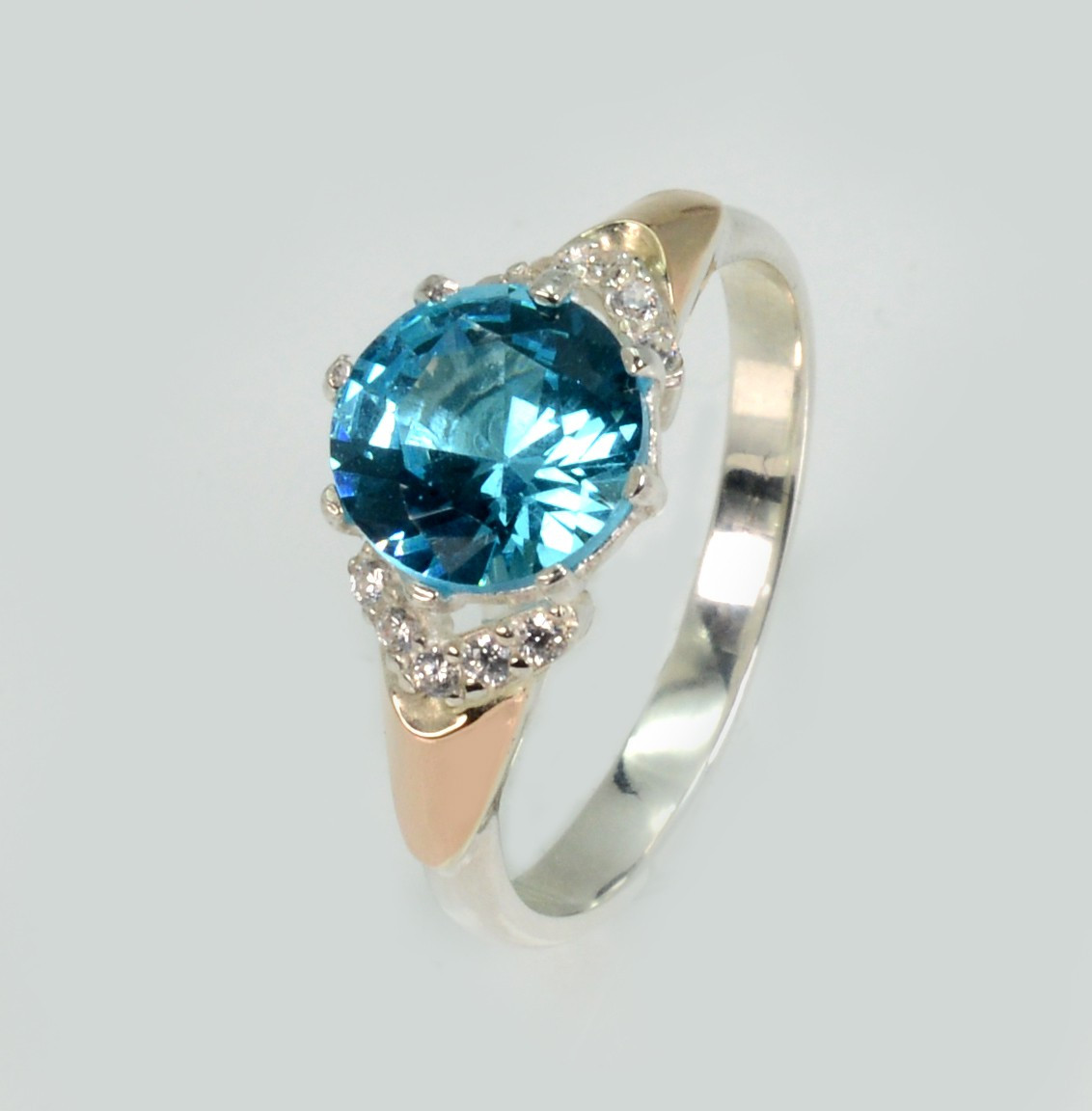 Срібна каблучка з золотими вставками, фото 1