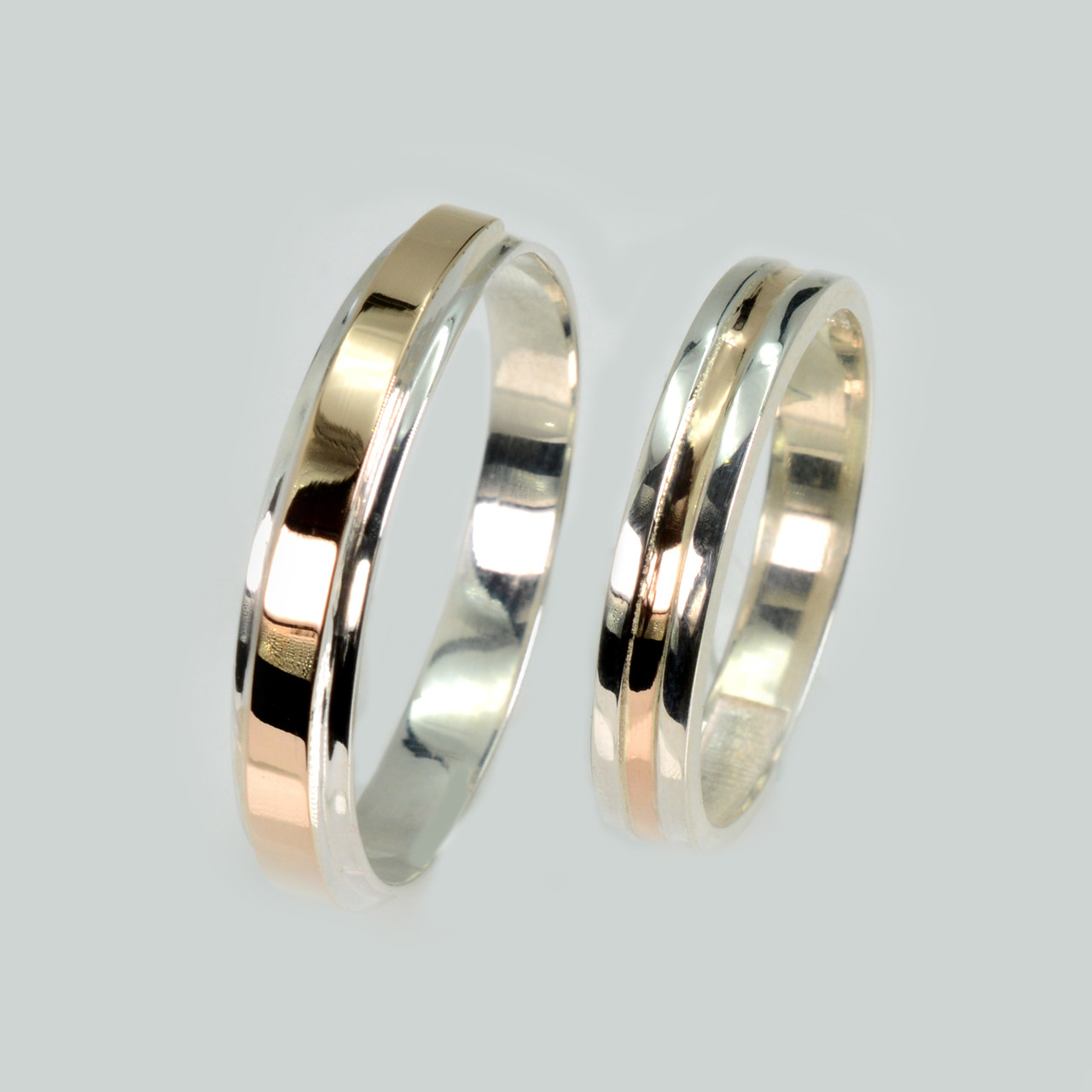 Пара срібних обручок з золотом, фото 1