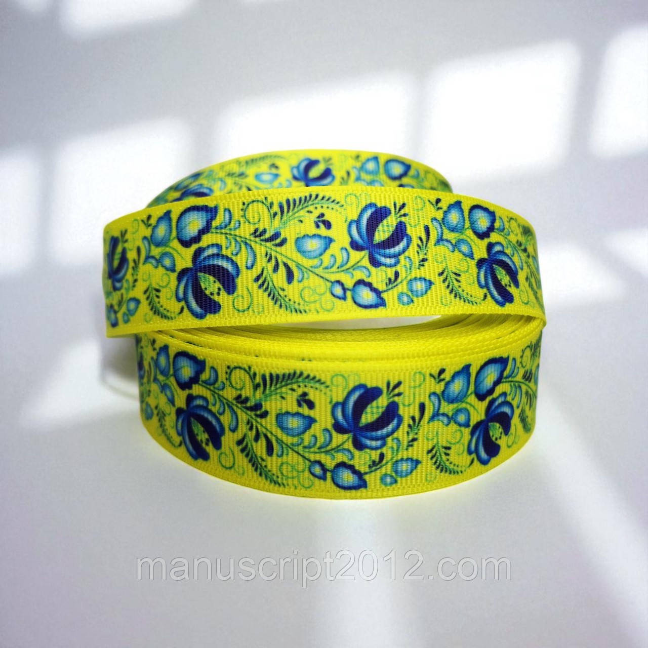 Стрічка репсова 2,5см. (22,5 м) жовта з синім українським орнаментом