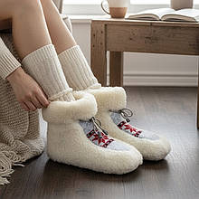 103 Чуні із овчини на гумовій підошві з вишивкою
