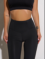 Жіночі термолосини з утепленої еластики з високою посадкою в чорному кольорі.