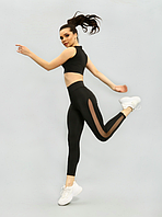 Спортивні жіночі еластичні штани з бічними вставками з сітки