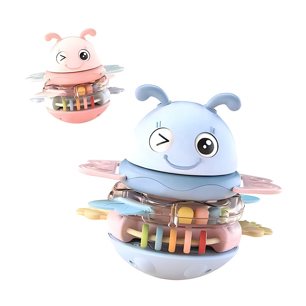 Цікава дитяча пірамідка-неваляшка іграшка-брязкальце з прорізувачем для тактильного розвитку 2 кольори мелодії, фото 1