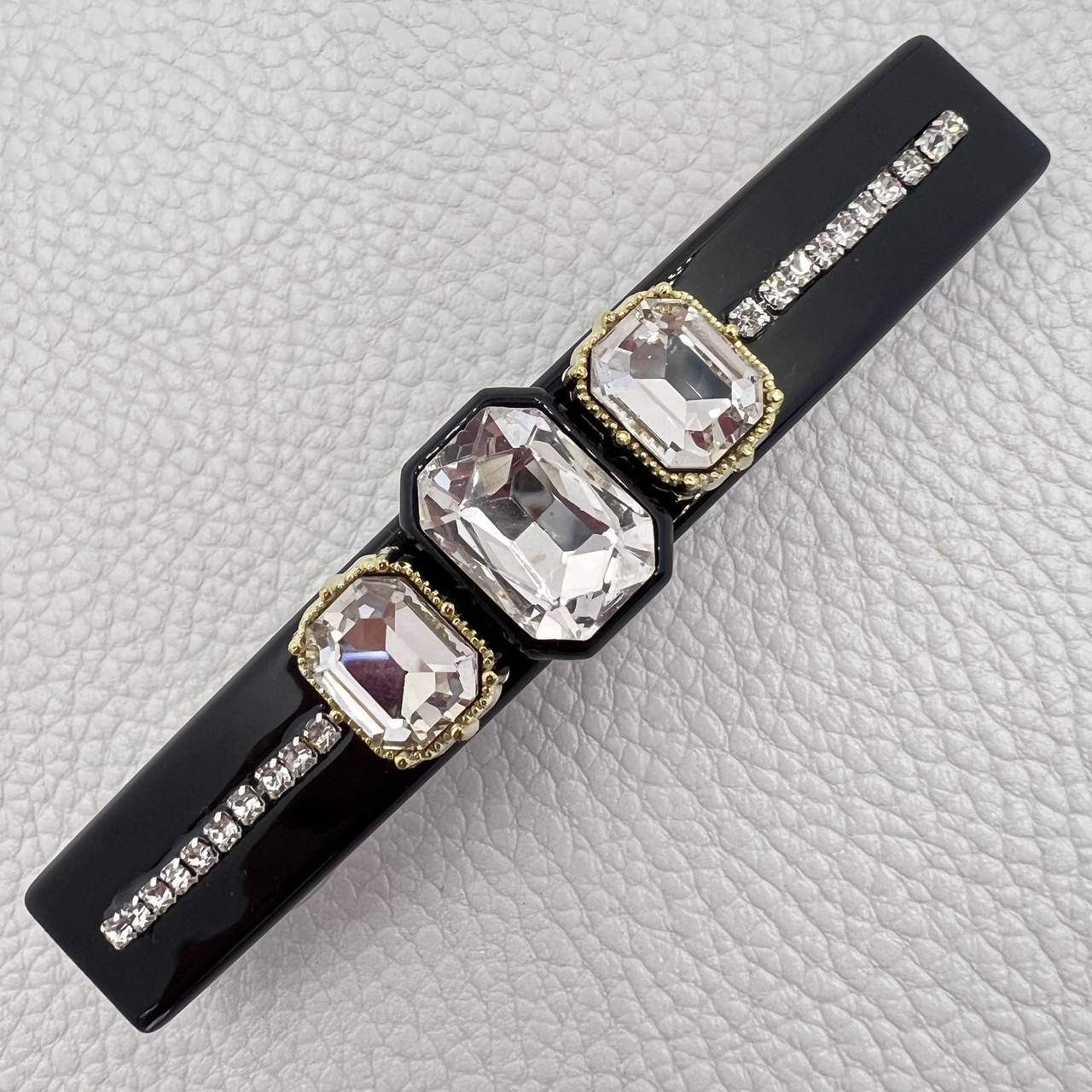 Заколка автомат для волос черного цвета с переливающимися белыми кристаллами длина 9 см ширина 1.5 см