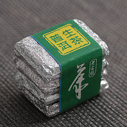 Юньнанський чай Пуер Туо клейкий рис, у цукерковій обгортці.(6-7г.) великолистовий зелений чай