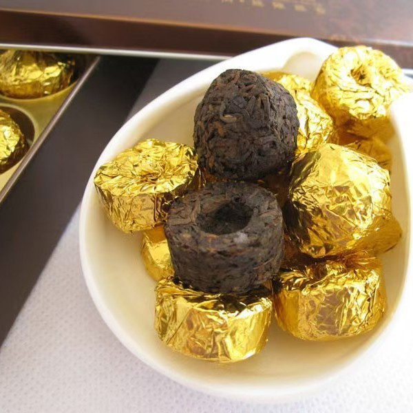 Стиглий чай Шу Пуер Оригінально приготований Золотий Сіотуо. 1 шт (5 г) Юньнань., фото 1