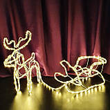 Декоративний новорічний олень із санками 110 х 46 см із дроту світний теплий колір, фігурка оленя новорічна, фото 3