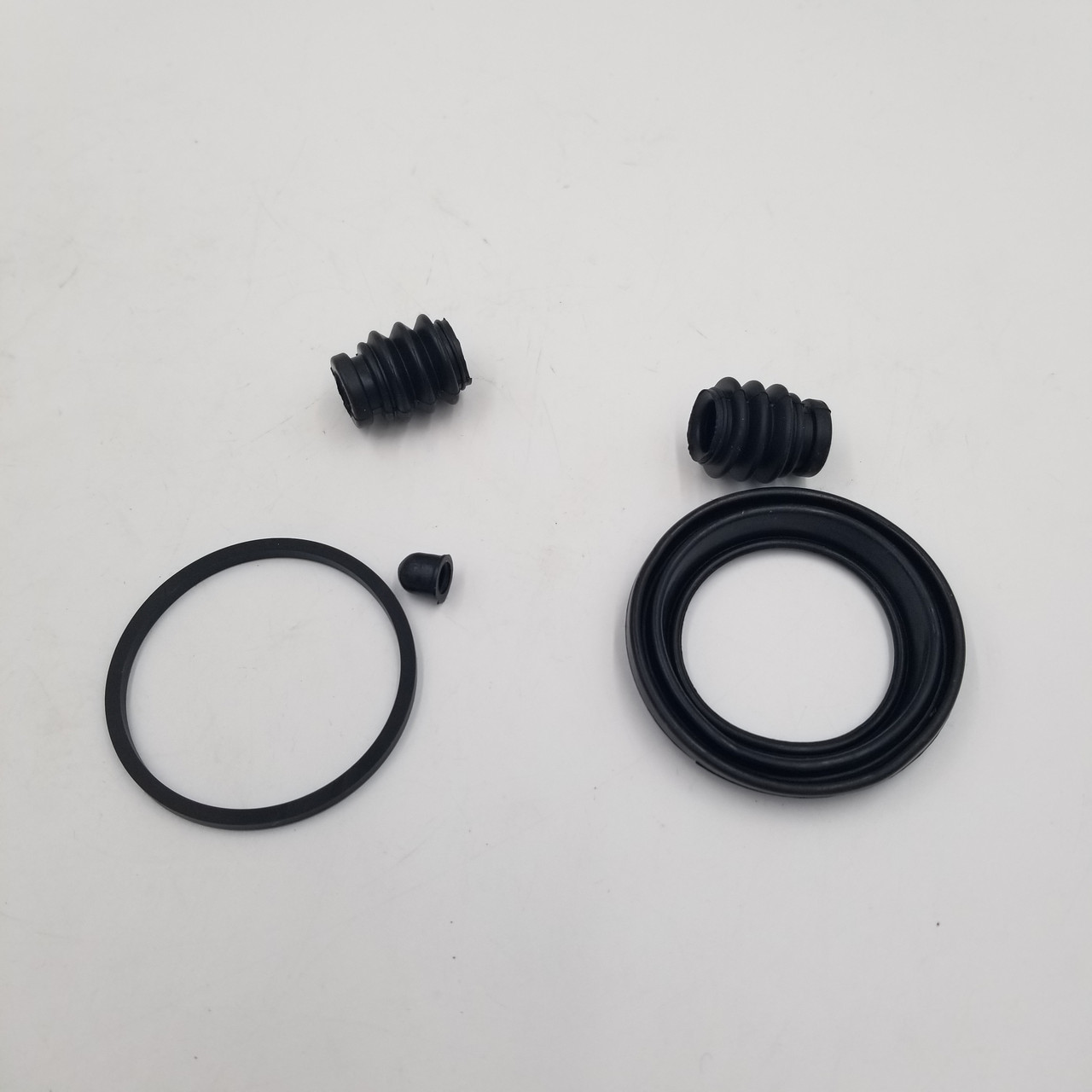 Ремкомплект супорта Лачетті передній (сальн.+пильн., 54 мм, 1 колесо) EuroEx Угорщина