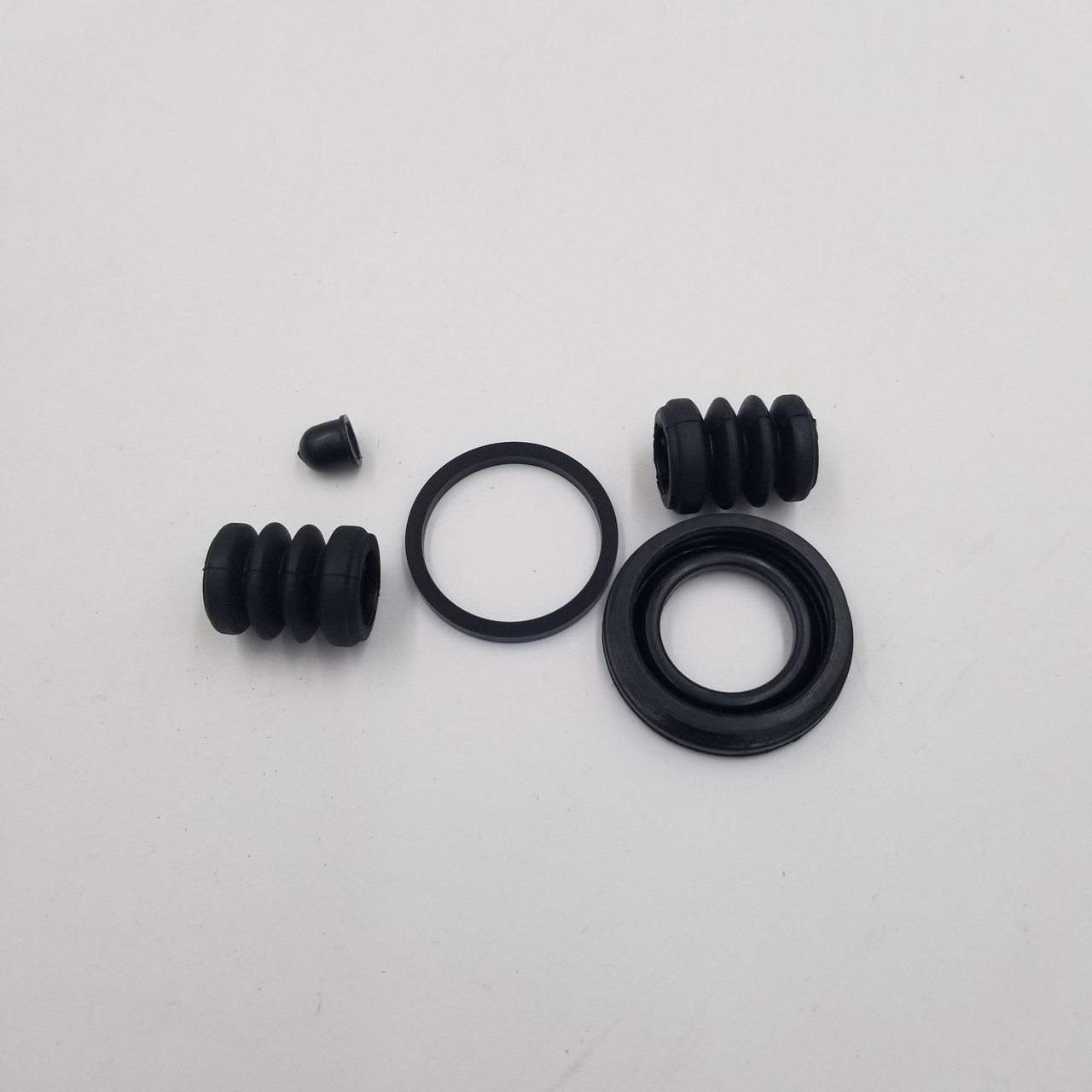 Ремкомплект супорта Лачетті задній (сальн.+пильн., 32 мм, 1 колесо) EuroEx Угорщина