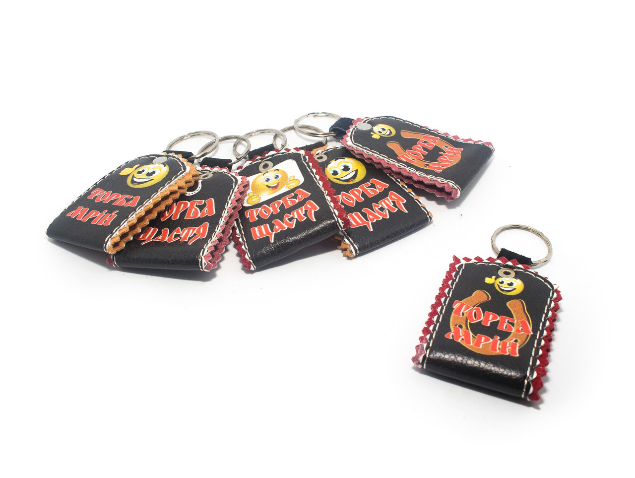 Сувенірні шкіряні брелки з написами