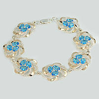 Срібний набір з золотими пластинами